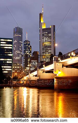 Stock Photography - Business center and Main River at night, Frankfurt, Germany. Fotosearch