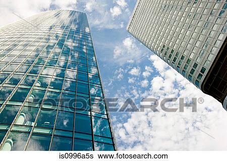 Clouds reflected in modern office buildings, Frankfurt, Germany View Large Photo Image Stock Photograph - Clouds reflected in modern office buildings, Frankfurt, Germany. Fotosearch