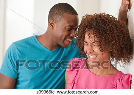 Stock Image - Couple laughing. Fotosearch