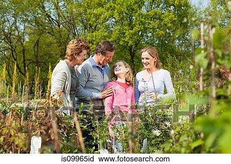 Family at garden center View Large Photo Image Stock Image - Family at garden center. Fotosearch