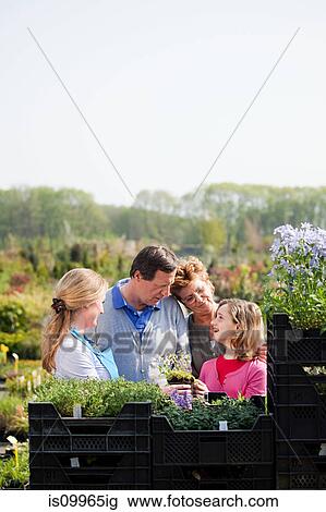 Family at garden center View Large Photo Image Stock Image - Family at garden center. Fotosearch