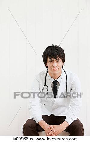 Stock Photo - Male doctor, portrait. Fotosearch