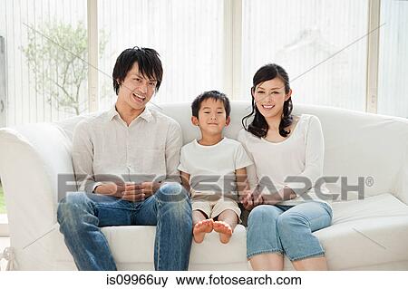 Parents and son on sofa, portrait View Large Photo Image Stock Photo - Parents and son on sofa, portrait. Fotosearch