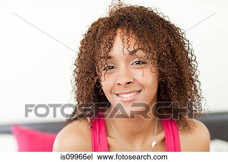 Portrait of woman smiling to camera View Large Photo Image Stock Image - Portrait of woman smiling to camera. Fotosearch