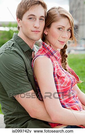 Portrait of young couple outdoors View Large Photo Image Stock Photo - Portrait of young couple outdoors. Fotosearch