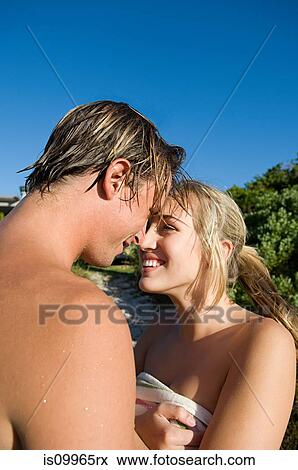 Young couple embracing View Large Photo Image Stock Photo - Young couple embracing. Fotosearch