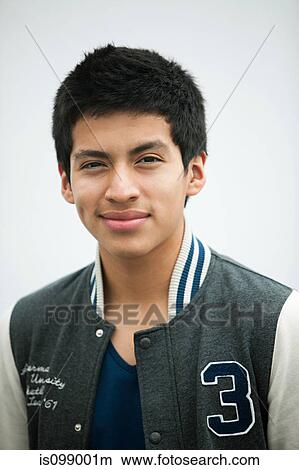 Young man wearing baseball jacket, portrait View Large Photo Image Picture - Young man wearing baseball jacket, portrait. Fotosearch