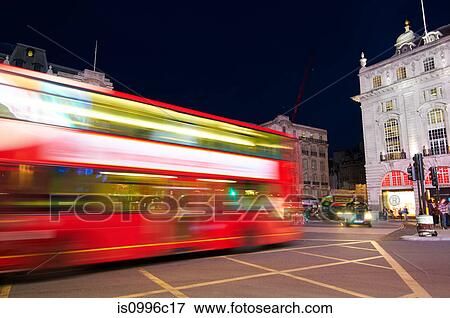 Stock Photo - Bus in motion on Piccadilly Circus, London, UK. Fotosearch