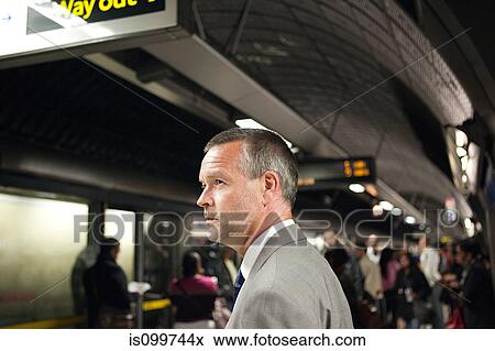 Businessman in subway station View Large Photo Image Stock Photo - Businessman in subway station. Fotosearch