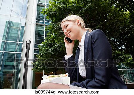 Businesswoman having lunch break View Large Photo Image Stock Image - Businesswoman having lunch break. Fotosearch