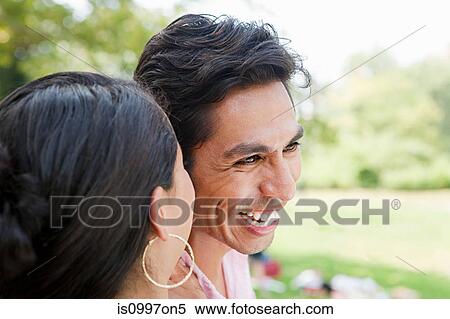 Close up of mid adult couple smiling View Large Photo Image Stock Photography - Close up of mid adult couple smiling. Fotosearch