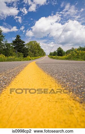Stock Image - Empty country road. Fotosearch
