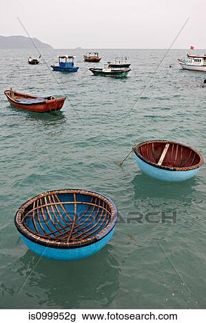 Fishing boats moored at Con Dao Island, Vietnam View Large Photo Image Stock Image - Fishing boats moored at Con Dao Island, Vietnam. Fotosearch