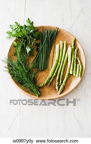 Fresh green vegetables on plate View Large Photo Image Stock Photo - Fresh green vegetables on plate. Fotosearch