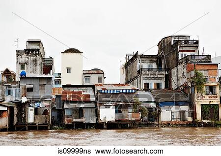 Houses along Mekong River, Can Tho, Vietnam View Large Photo Image Stock Photograph - Houses along Mekong River, Can Tho, Vietnam. Fotosearch