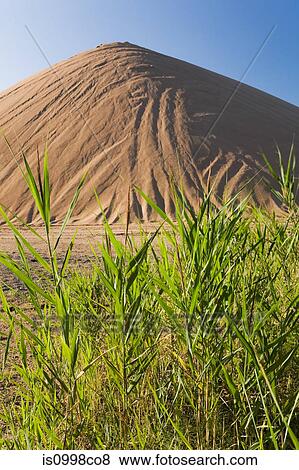 Mound of sand at quarry View Large Photo Image Stock Photo - Mound of sand at quarry. Fotosearch