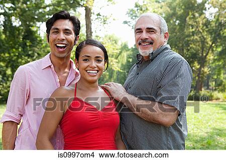 Portrait of mid adult couple and mature man View Large Photo Image Picture - Portrait of mid adult couple and mature man. Fotosearch