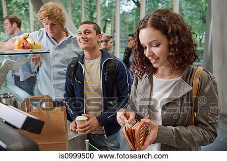 University student paying in college cafe View Large Photo Image Stock Image - University student paying in college cafe. Fotosearch