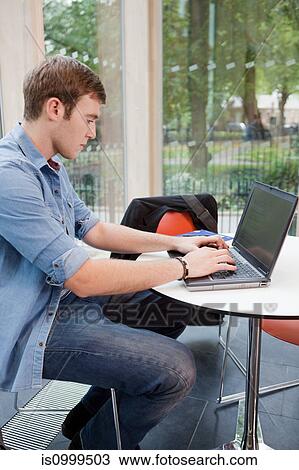 University student working on laptop View Large Photo Image Stock Image - University student working on laptop. Fotosearch