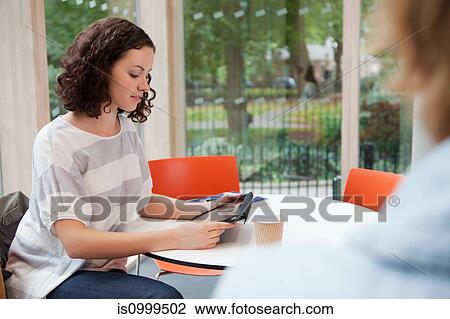 University student working on tablet View Large Photo Image Stock Image - University student working on tablet. Fotosearch