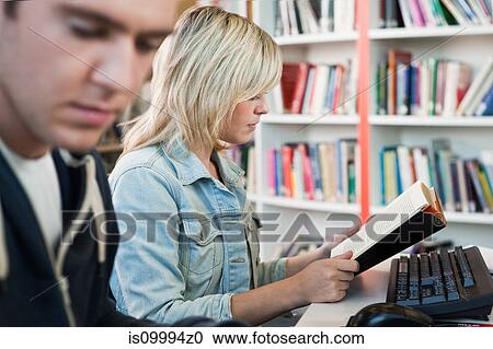 University students in college library View Large Photo Image Stock Image - University students in college library. Fotosearch