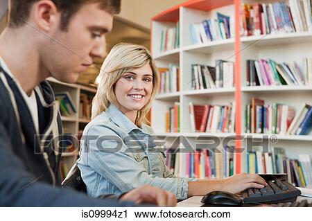 University students in college library, portrait View Large Photo Image Stock Image - University students in college library, portrait. Fotosearch