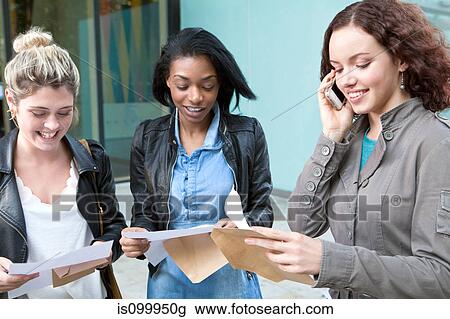 University students receiving their exam results View Large Photo Image Stock Image - University students receiving their exam results. Fotosearch