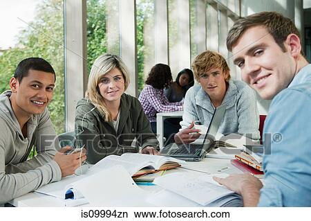 Picture - University students working together, portrait. Fotosearch