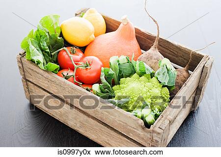 Stock Photo - Wooden crate of fresh vegetables. Fotosearch