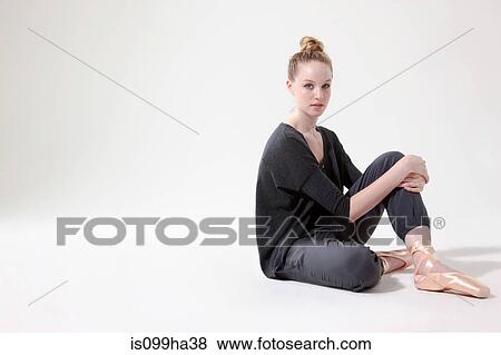 Ballerina taking a break View Large Photo Image Stock Photo - Ballerina taking a break. Fotosearch