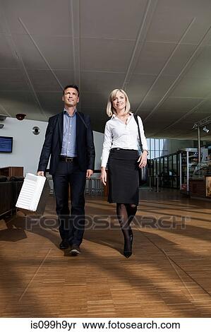 Business partners leaving airport View Large Photo Image Stock Photography - Business partners leaving airport. Fotosearch
