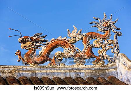 Picture - Dragon detail on temple roof, Hoi An, Quang Nam Province, Vietnam. Fotosearch