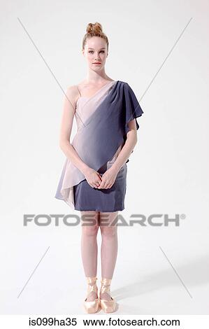 Stock Photography - Female ballerina standing. Fotosearch