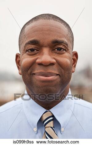 Mature businessman smiling, portrait View Large Photo Image Stock Photograph - Mature businessman smiling, portrait. Fotosearch