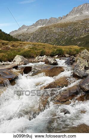 Stock Image - Mountain and river scenery, Adamello Brenta National Park, Trentino, Italy. Fotosearch
