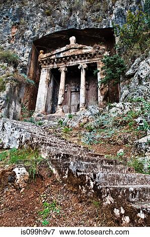 Temple ruins in cliff face, Fethiye, Turkey View Large Photo Image Stock Photo - Temple ruins in cliff face, Fethiye, Turkey. Fotosearch