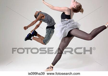 Stock Photo - Traditional and contemporary dancers performing. Fotosearch