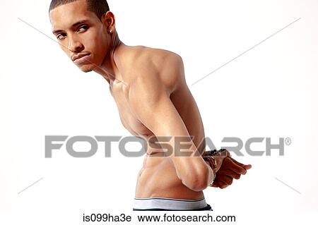 Young man bent in awkward position View Large Photo Image Stock Image - Young man bent in awkward position. Fotosearch