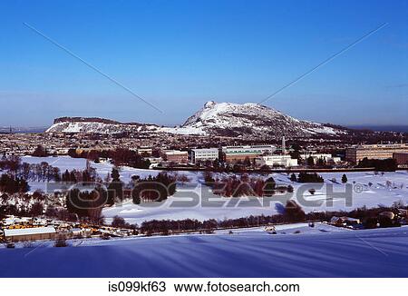 Stock Image - Arthur's Seat and central Edinburgh viewed from Braid Hills, Edinburgh. Fotosearch