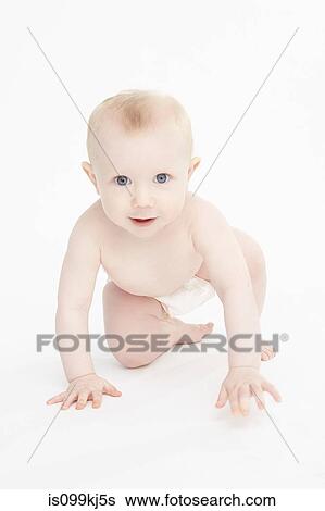 Stock Photograph - Baby boy crawling. Fotosearch
