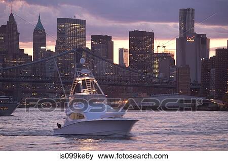 Boat on East River, New York City, USA View Large Photo Image Stock Photo - Boat on East River, New York City, USA. Fotosearch