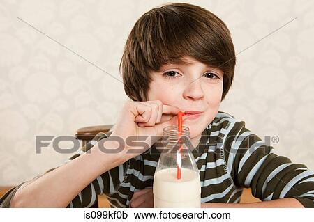 Stock Image - Boy drinking milk. Fotosearch
