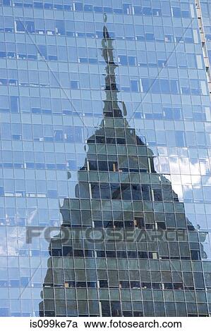 Building reflected in glass of skyscraper View Large Photo Image Stock Image - Building reflected in glass of skyscraper. Fotosearch
