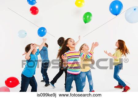 Children playing with balloons View Large Photo Image Stock Image - Children playing with balloons. Fotosearch