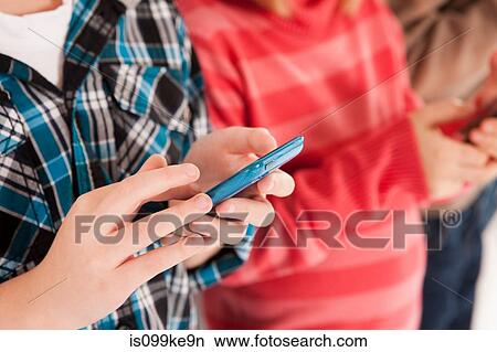 Children using smartphones View Large Photo Image Picture - Children using smartphones. Fotosearch
