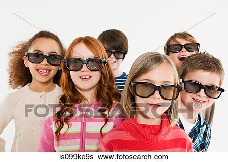 Children wearing 3D glasses View Large Photo Image Stock Photograph - Children wearing 3D glasses. Fotosearch