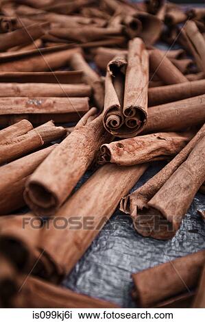 Stock Image - Cinnamon sticks at Roseau Market, Dominica, Lesser Antilles. Fotosearch
