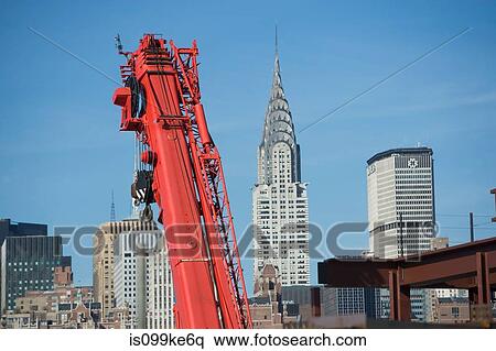Crane and buildings in New York City, USA View Large Photo Image Stock Photography - Crane and buildings in New York City, USA. Fotosearch
