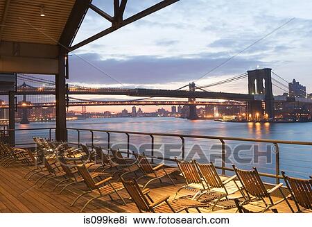 Deckchairs overlooking East River, New York City, USA View Large Photo Image Stock Image - Deckchairs overlooking East River, New York City, USA. Fotosearch