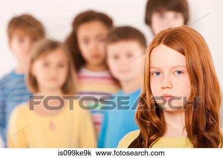 Girl separate from other children View Large Photo Image Stock Image - Girl separate from other children. Fotosearch